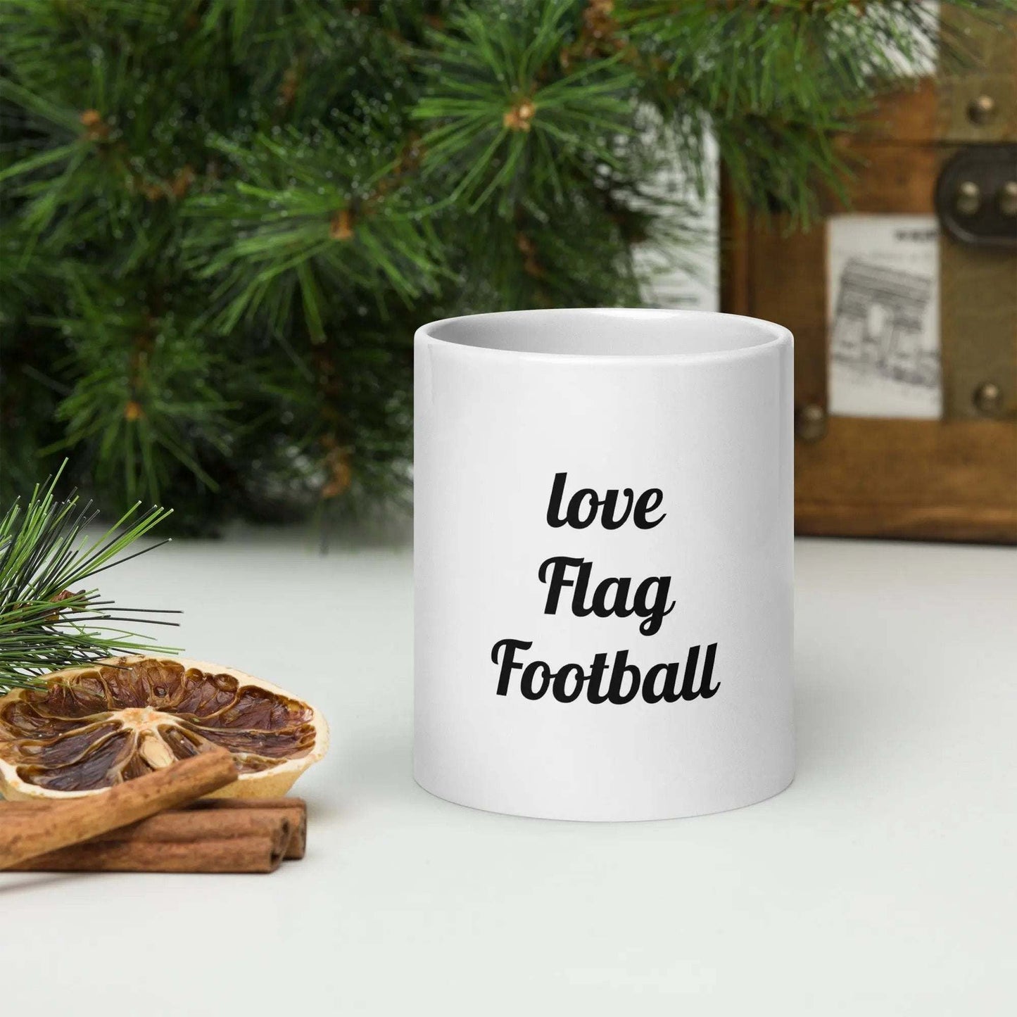White glossy ceramic mug with flag football design, microwave and dishwasher safe
