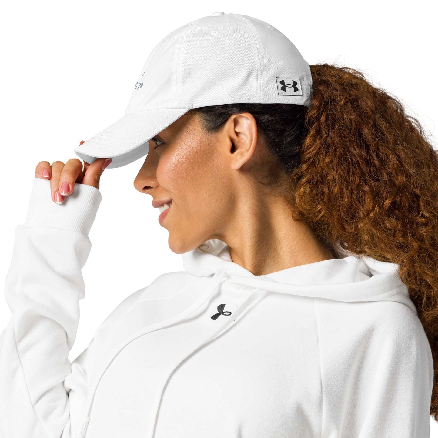 Under Armour Rugby hat with HeatGear sweatband, adjustable strap, and curved visor for comfort and durability