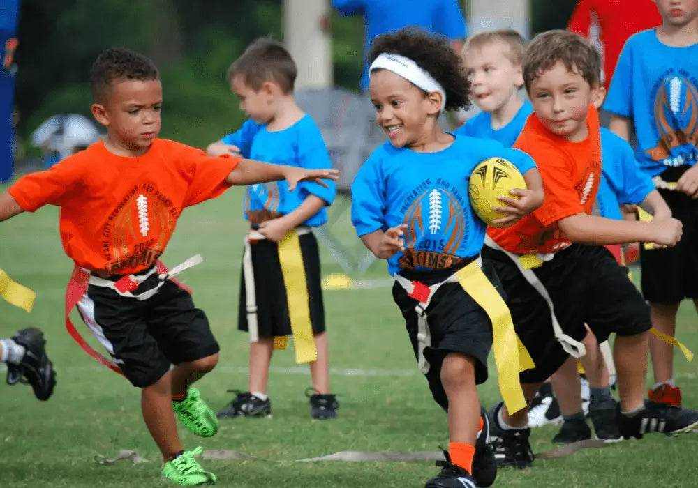 Youth flag football game showcasing kids playing in a local flag football league youth team