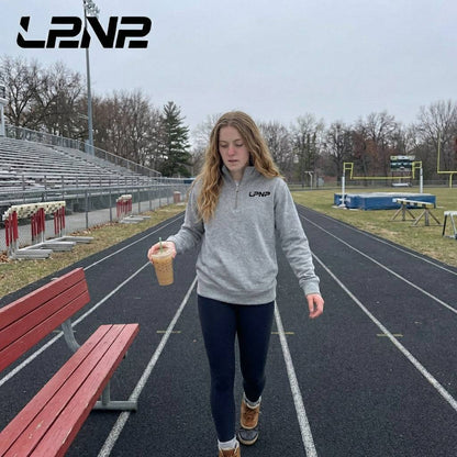 Fleece pullover in carbon grey with soft fleece lining and relaxed fit for track and field warmth