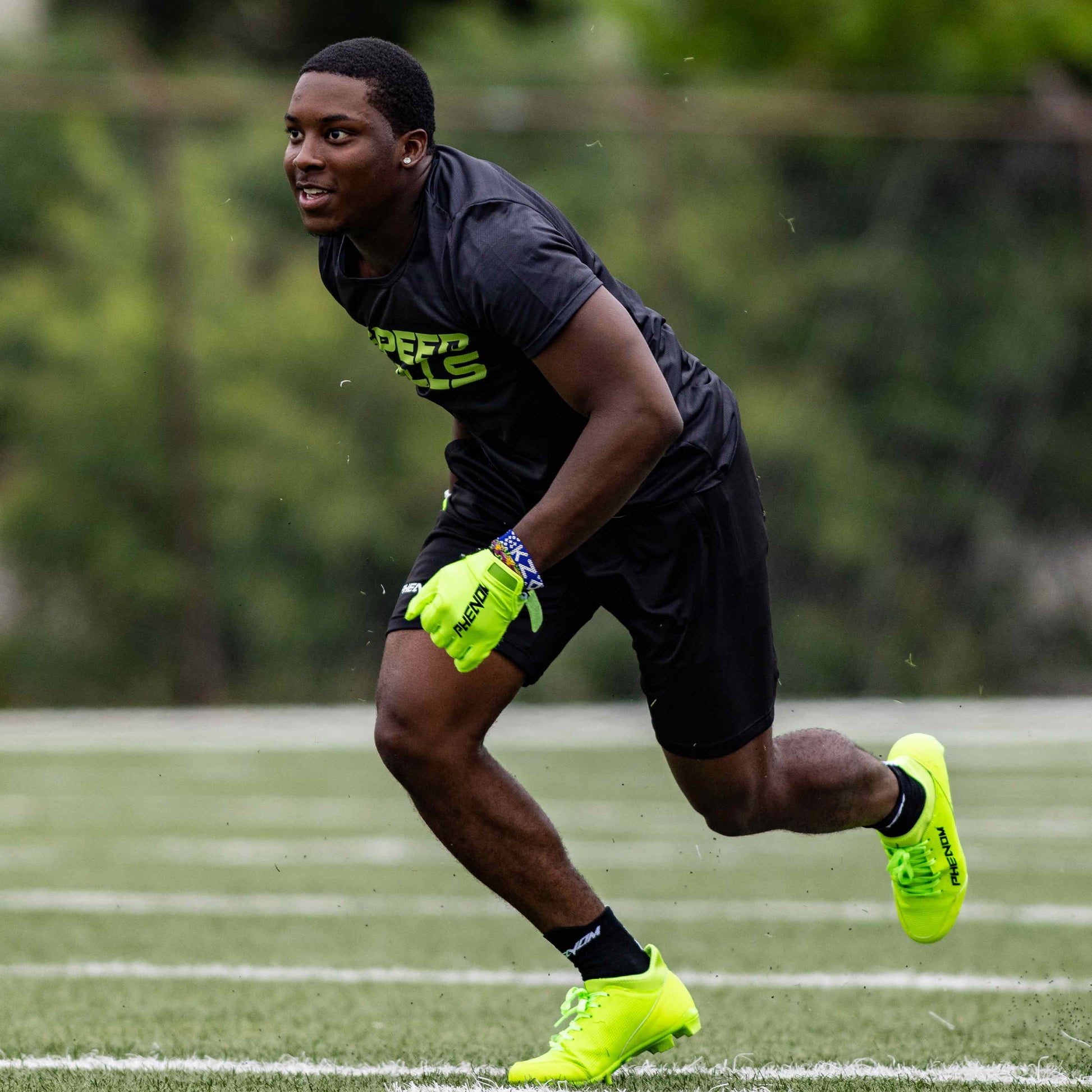 Velocity 3.0: Football Cleats - Slime Phenom Elite Brand