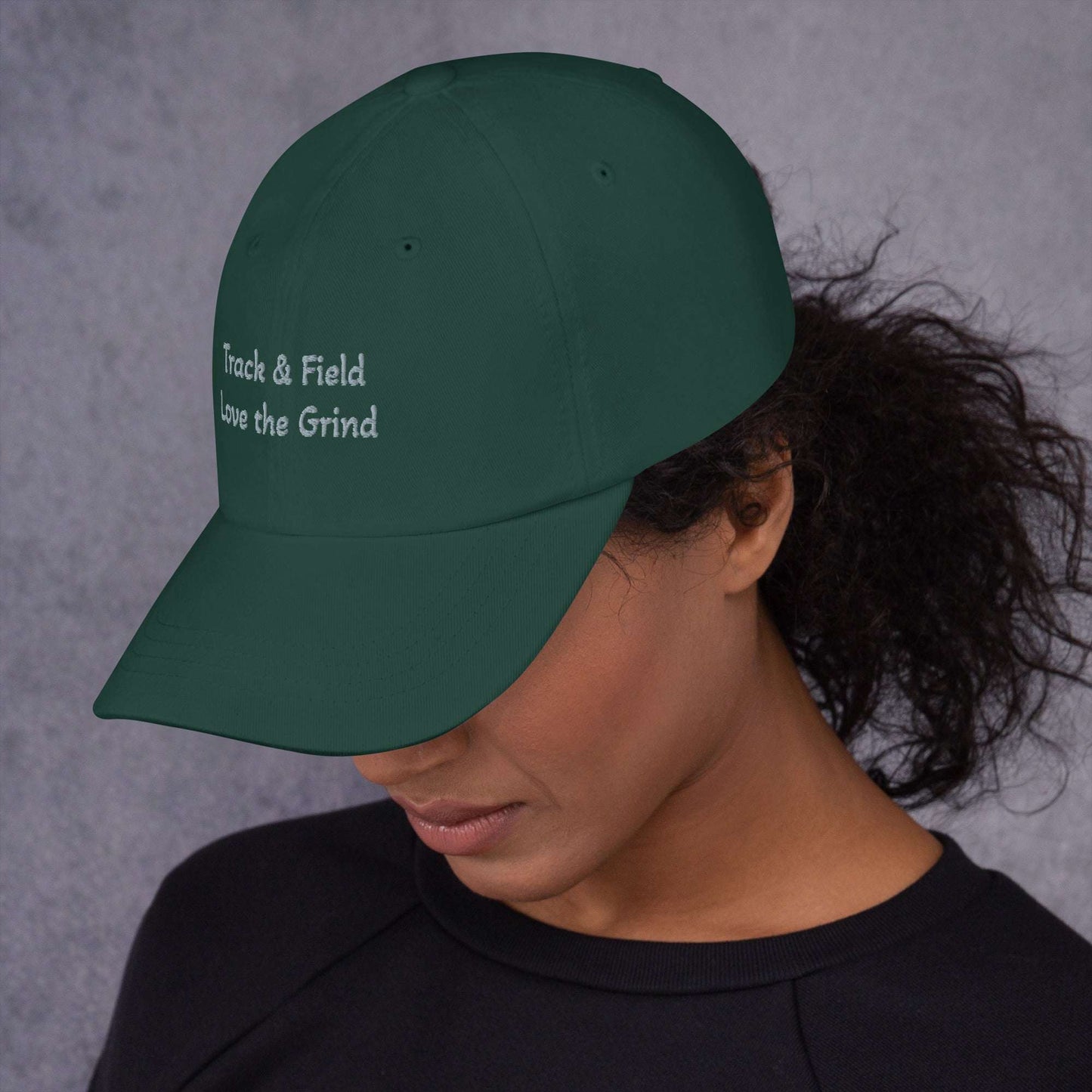 Track and Field hat green camo with low-profile, adjustable strap, and curved visor