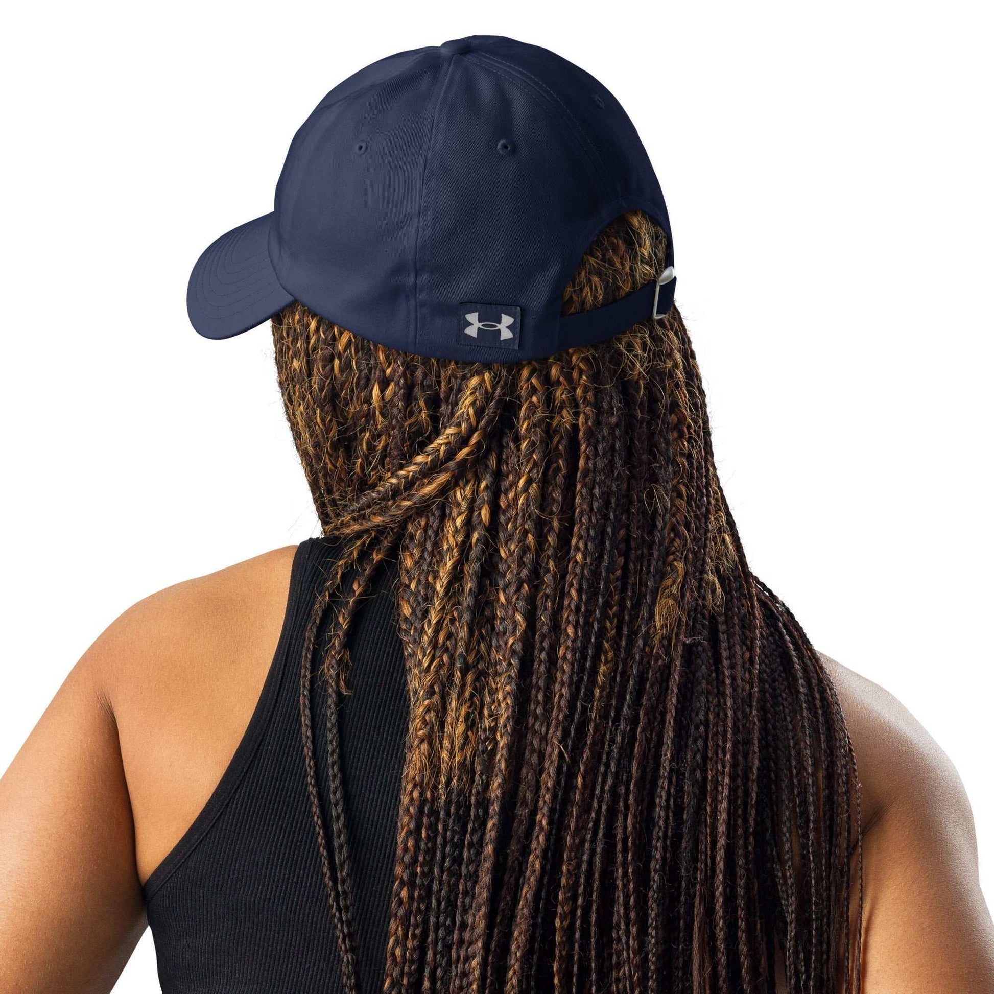 Under Armour® dad hat with HeatGear® sweatband, 6-panel low-profile design, curved visor, and adjustable strap for comfort and durability